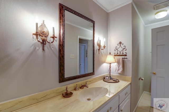 bathroom with vanity, tile patterned floors, and ornamental molding