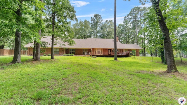 2 Spring Valley Ln, Texarkana, AR 71854 - view of front of house featuring a wooden deck and a chimney