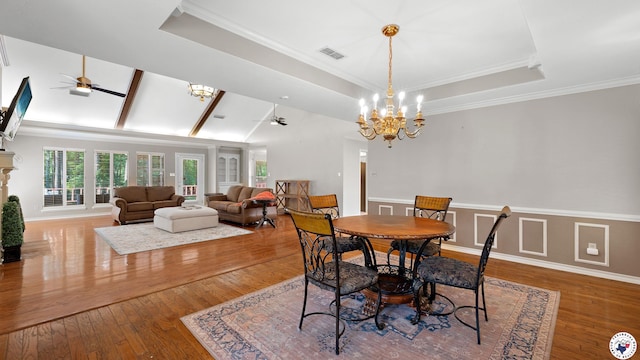 2 Spring Valley Ln, Texarkana, AR 71854 - dining room with ceiling fan, a chandelier, ornamental molding, wood-type flooring, and a raised ceiling