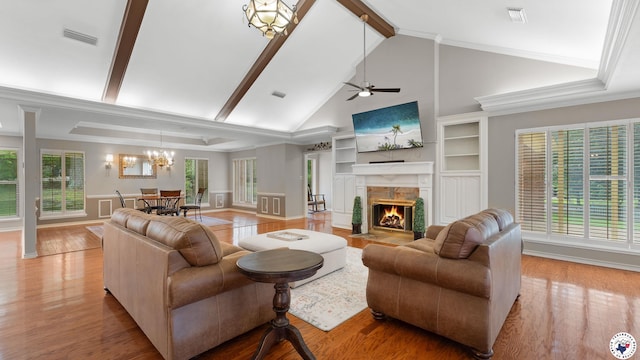 2 Spring Valley Ln, Texarkana, AR 71854 - living room featuring a chandelier, a fireplace, high vaulted ceiling, wood finished floors, and ceiling fan
