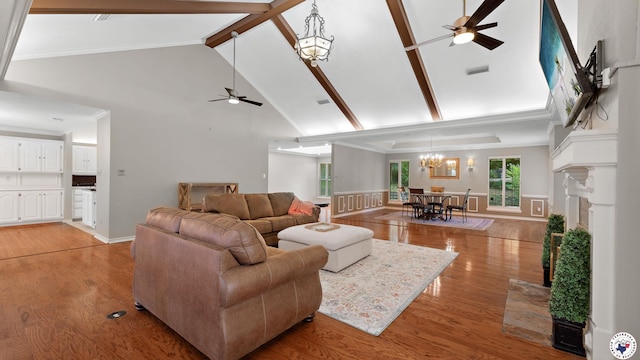 2 Spring Valley Ln, Texarkana, AR 71854 - living area featuring ceiling fan, high vaulted ceiling, a chandelier, beamed ceiling, and light wood-type flooring