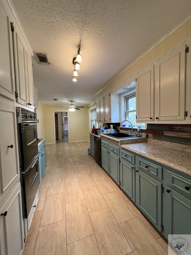 30 Broadmoor Dr, Texarkana, AR 71854 - kitchen with a sink, black appliances, a ceiling fan, a textured ceiling, and dark countertops