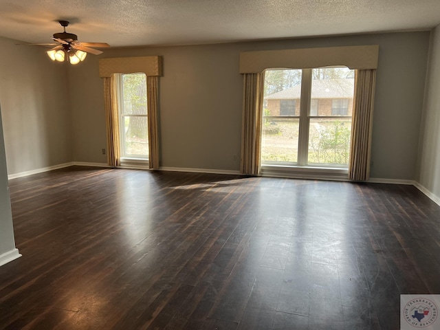 30 Broadmoor Dr, Texarkana, AR 71854 - unfurnished room featuring dark wood-style flooring, ceiling fan, baseboards, and a textured ceiling