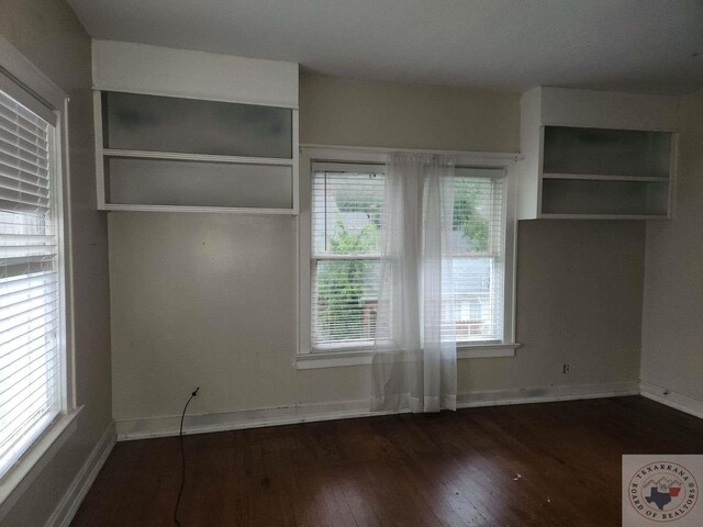 interior space with dark hardwood / wood-style flooring