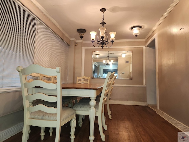 dining room featuring a notable chandelier, ornamental molding, and dark hardwood / wood-style flooring