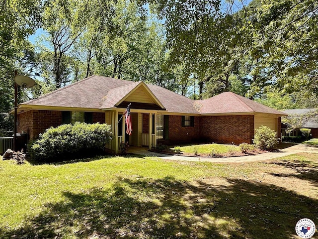 3119CLEARCREE Clear Crk, Texarkana, TX 75503 - ranch-style home with a front yard, brick siding, and an attached garage