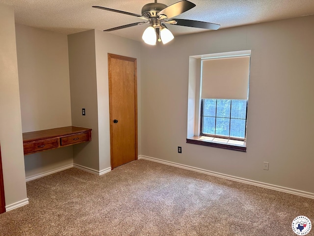 3119CLEARCREE Clear Crk, Texarkana, TX 75503 - spare room with carpet, a ceiling fan, a textured ceiling, and baseboards