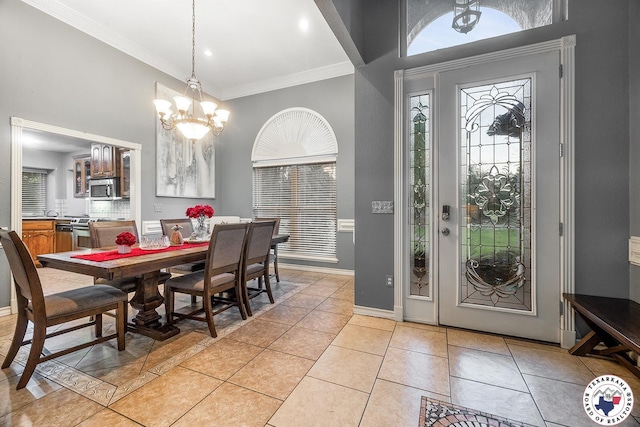 6404 N Park Rd, Texarkana, TX 75503 - foyer featuring light tile patterned flooring, baseboards, a chandelier, and ornamental molding