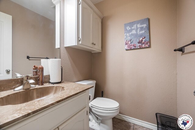 6404 N Park Rd, Texarkana, TX 75503 - half bath featuring vanity, tile patterned floors, baseboards, and toilet