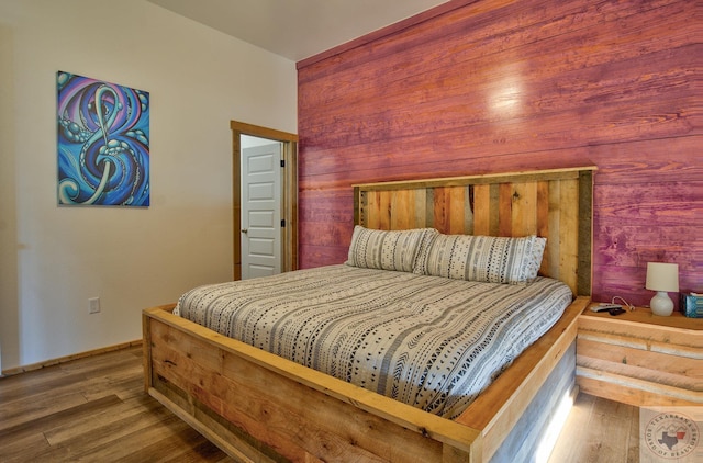 bedroom featuring hardwood / wood-style floors