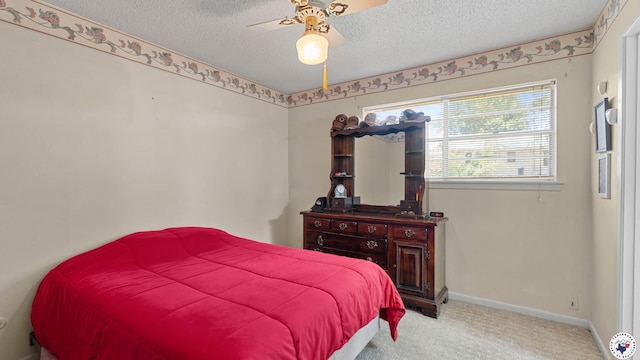 4133 Minden Ave, Texarkana, AR 71854 - carpeted bedroom featuring a textured ceiling, baseboards, and ceiling fan