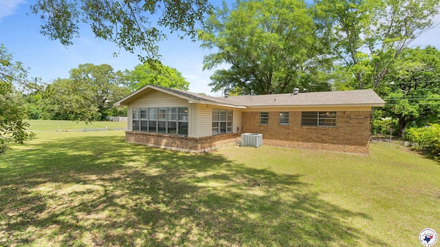 4133 Minden Ave, Texarkana, AR 71854 - back of property with brick siding, central AC unit, and a sunroom