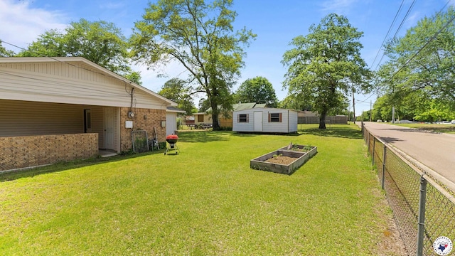 4133 Minden Ave, Texarkana, AR 71854 - view of yard with a storage unit and an outdoor structure