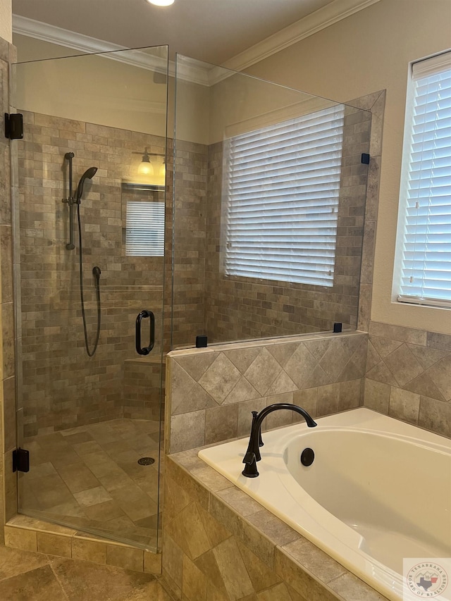 bathroom with independent shower and bath and ornamental molding