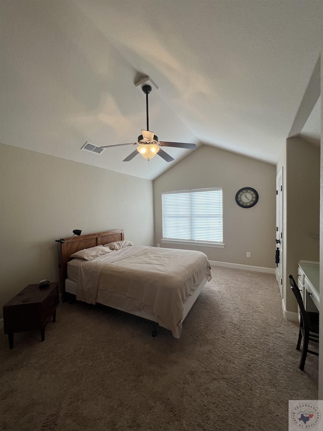 carpeted bedroom with ceiling fan and vaulted ceiling