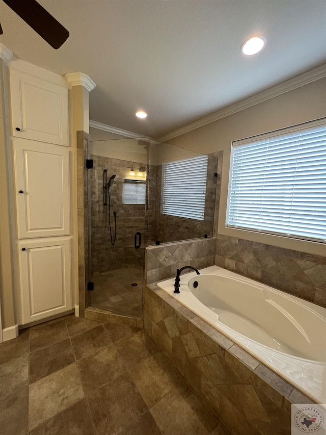 bathroom with crown molding and plus walk in shower