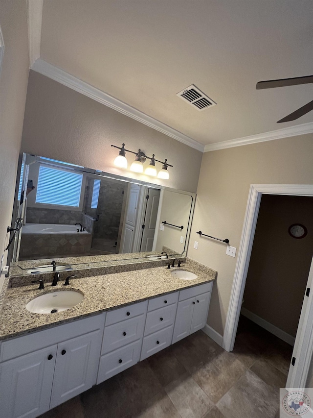 bathroom with vanity, ceiling fan, a tub, and crown molding