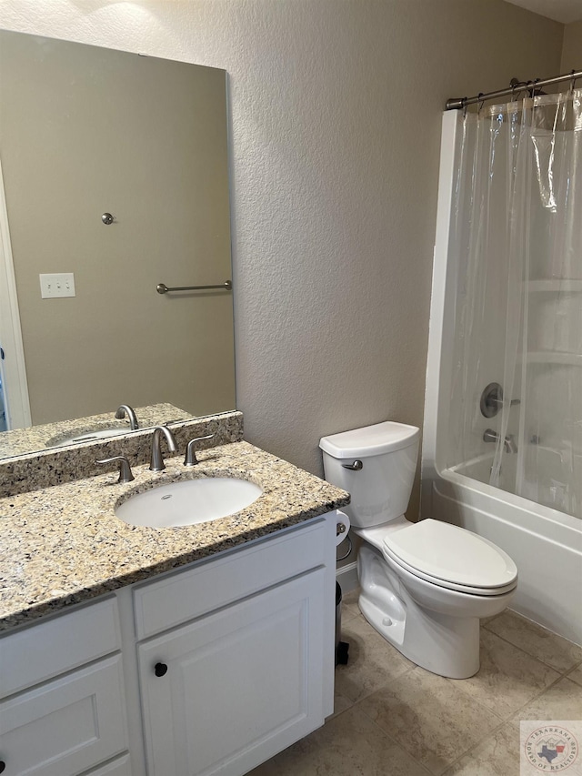 full bathroom featuring toilet, vanity, shower / bath combo, and tile patterned flooring