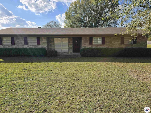 123 Texas Ln, New Boston, TX 75570 - ranch-style home with a front lawn and brick siding