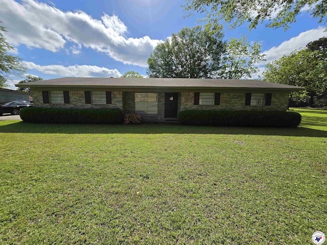 123 Texas Ln, New Boston, TX 75570 - ranch-style home with a front yard and stone siding