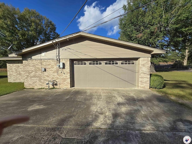123 Texas Ln, New Boston, TX 75570 - view of home's exterior with brick siding, driveway, and a garage