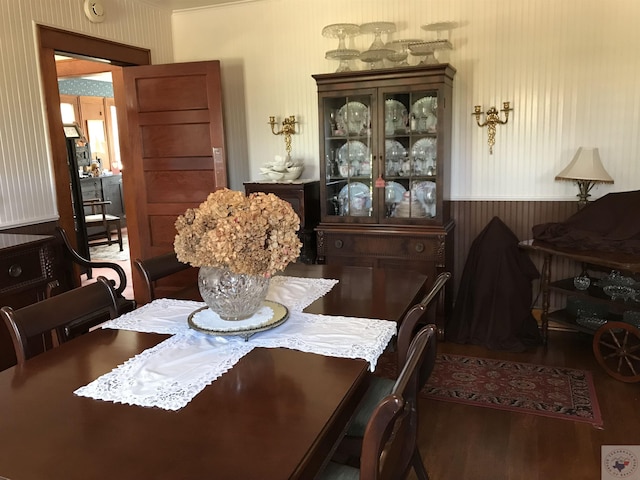 dining area with hardwood / wood-style flooring