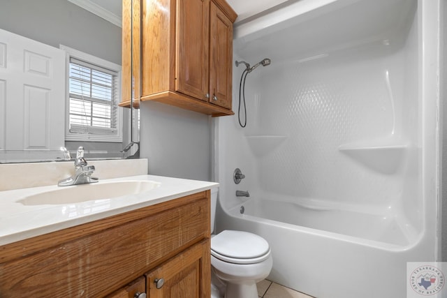 full bathroom with tub / shower combination, crown molding, tile patterned flooring, toilet, and vanity