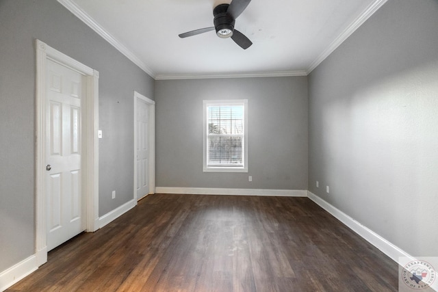 spare room featuring dark wood-type flooring, ceiling fan, and ornamental molding