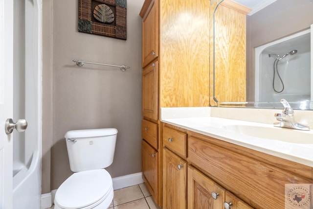 bathroom featuring vanity, toilet, walk in shower, and tile patterned flooring