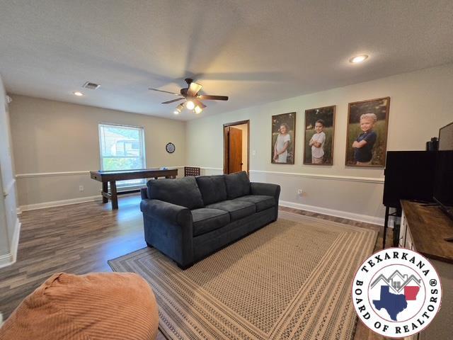 7 Summer Ln, Texarkana, TX 75503 - living room with ceiling fan, wood finished floors, baseboards, pool table, and recessed lighting