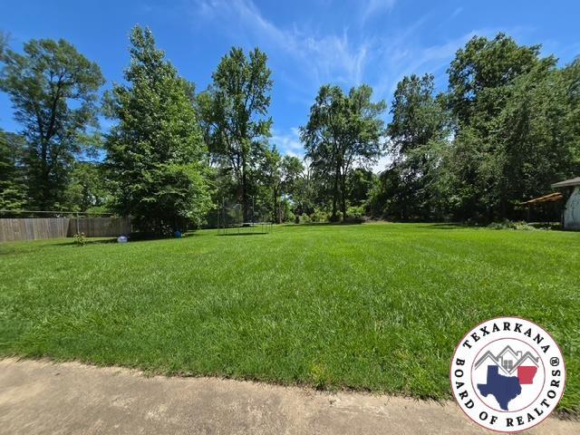 7 Summer Ln, Texarkana, TX 75503 - view of yard featuring view of scattered trees