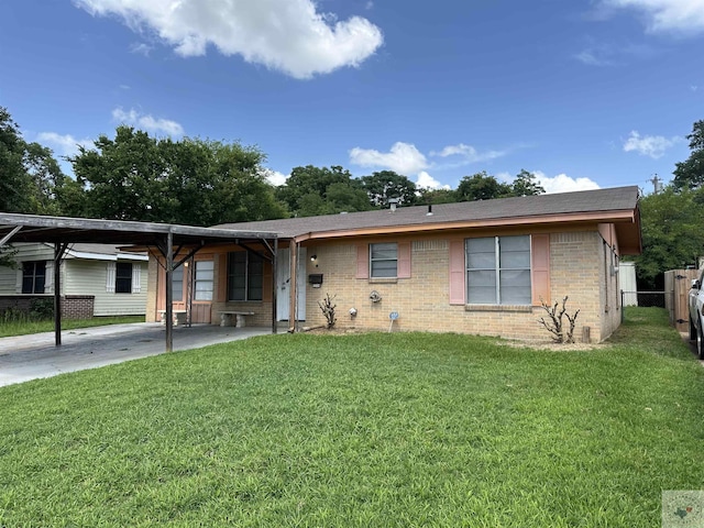 ranch-style home with a front lawn and a carport