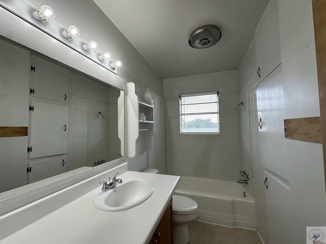 full bathroom featuring vanity, toilet, tile patterned floors, and tiled shower / bath