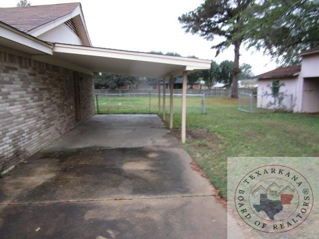 view of yard featuring a carport