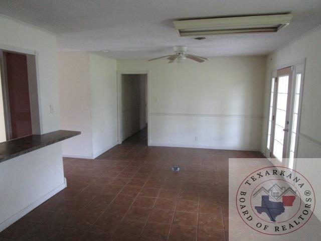 interior space featuring ceiling fan