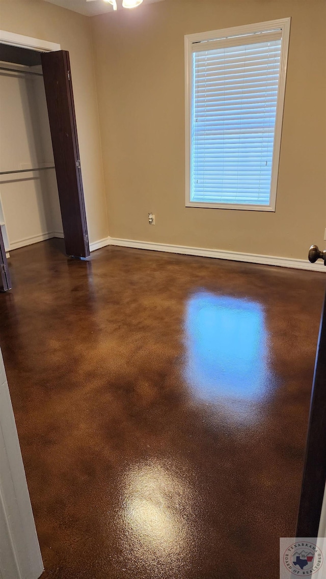 unfurnished bedroom featuring a closet