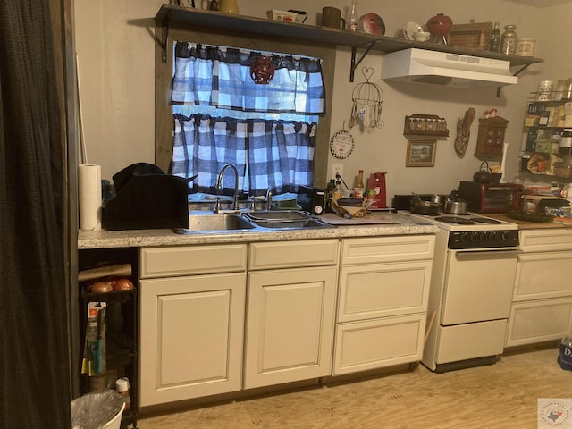 kitchen featuring sink, white cabinets, white electric stove, and light hardwood / wood-style flooring