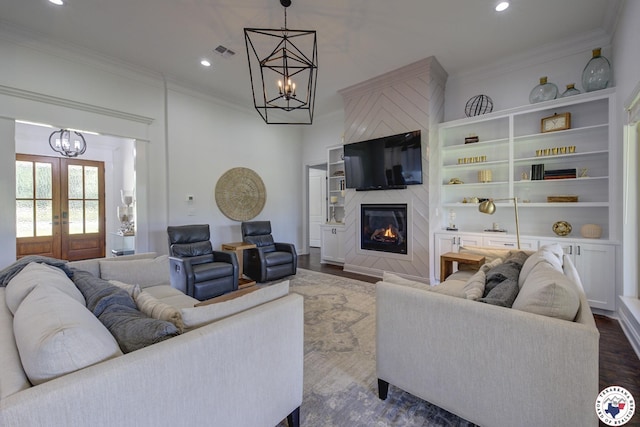 8203 Teal Rd, Texarkana, TX 75503 - living area featuring a chandelier, ornamental molding, a large fireplace, recessed lighting, and dark wood finished floors