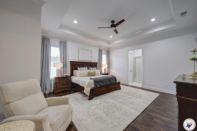 8203 Teal Rd, Texarkana, TX 75503 - bedroom with a tray ceiling, dark wood-style floors, recessed lighting, and ceiling fan