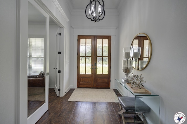 8203 Teal Rd, Texarkana, TX 75503 - foyer with french doors, a chandelier, dark wood-style flooring, and crown molding