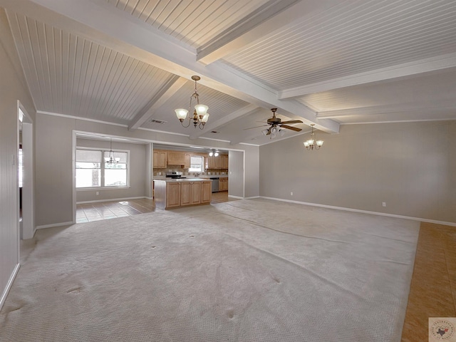 unfurnished living room featuring light carpet, ceiling fan with notable chandelier, and lofted ceiling with beams