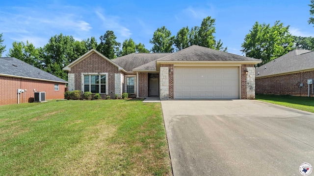 5005 Hidden Acres Dr, Texarkana, TX 75503 - ranch-style home with brick siding, a garage, a front lawn, concrete driveway, and roof with shingles