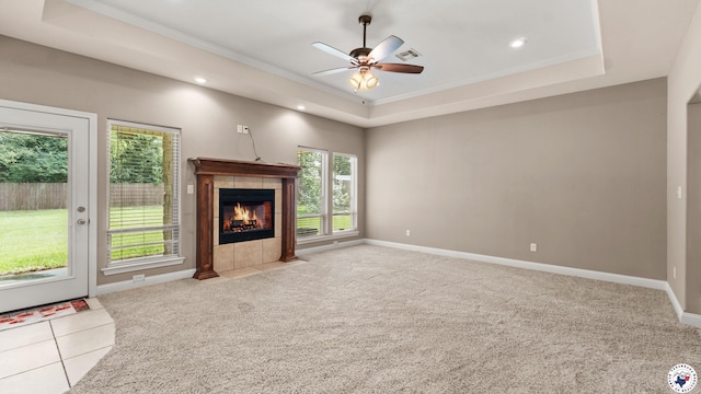 5005 Hidden Acres Dr, Texarkana, TX 75503 - unfurnished living room with a raised ceiling, ceiling fan, a fireplace, carpet flooring, and recessed lighting