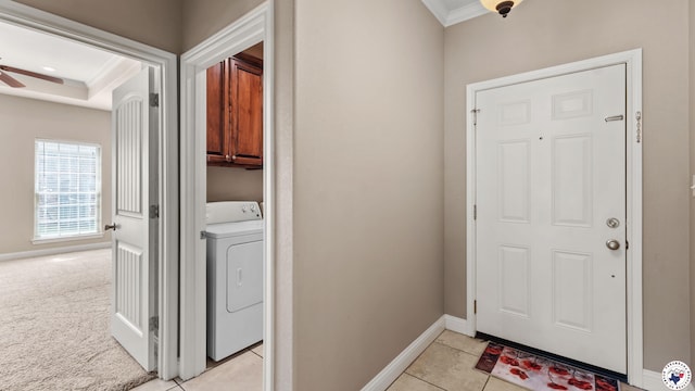 5005 Hidden Acres Dr, Texarkana, TX 75503 - washroom with washer / clothes dryer, crown molding, cabinet space, ceiling fan, and light tile patterned floors