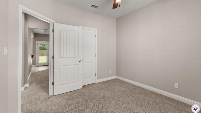 5005 Hidden Acres Dr, Texarkana, TX 75503 - unfurnished bedroom with carpet flooring and ceiling fan