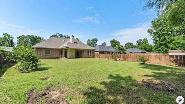 5005 Hidden Acres Dr, Texarkana, TX 75503 - back of house featuring a chimney and a fenced backyard