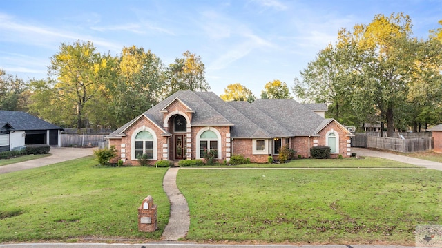 view of front of house with a front lawn