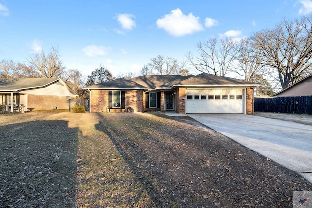 ranch-style home featuring a garage