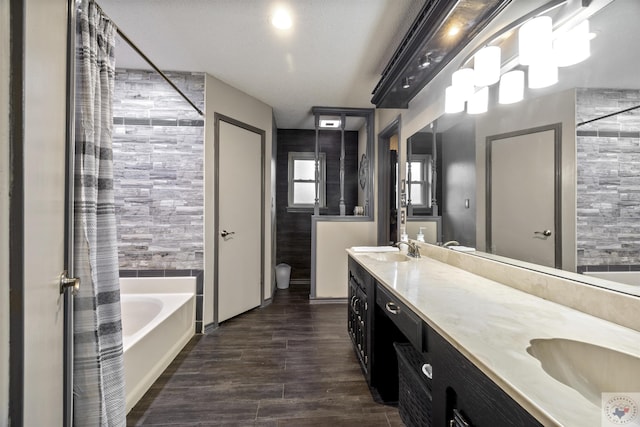 bathroom featuring vanity and a textured ceiling