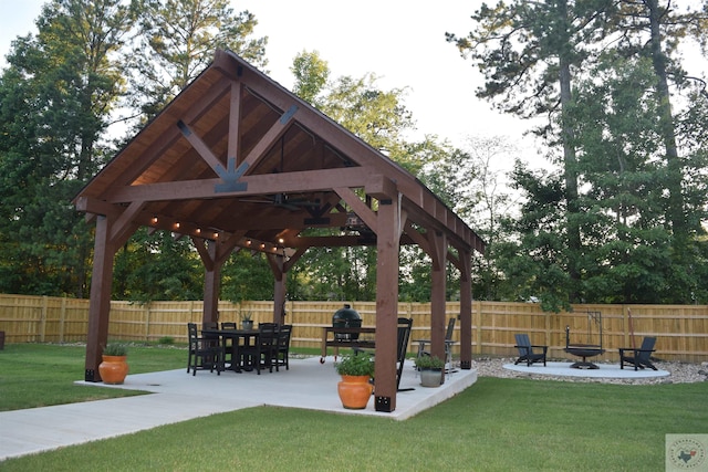 surrounding community featuring a gazebo, a yard, and a patio